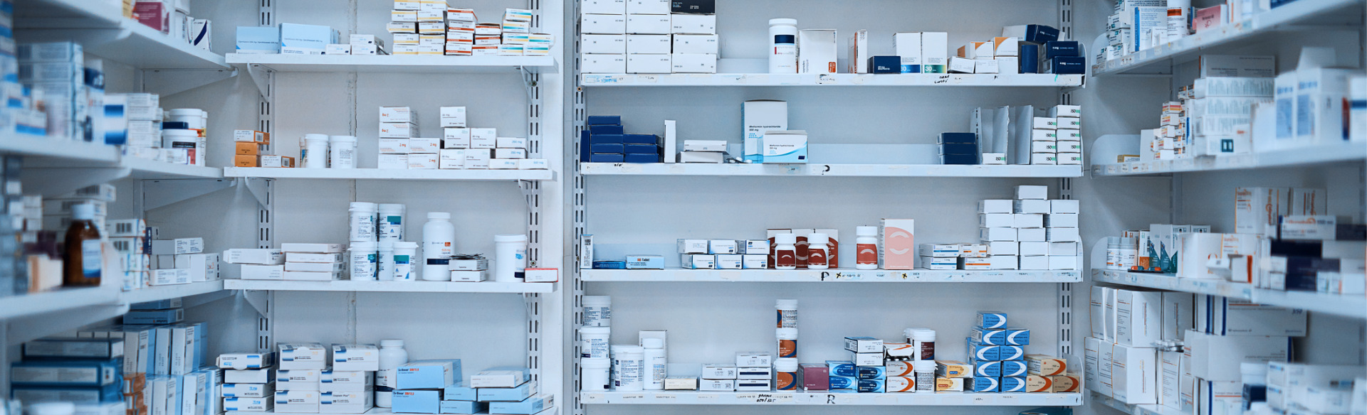 hospital pharmacy shelves with various prescriptions and medications