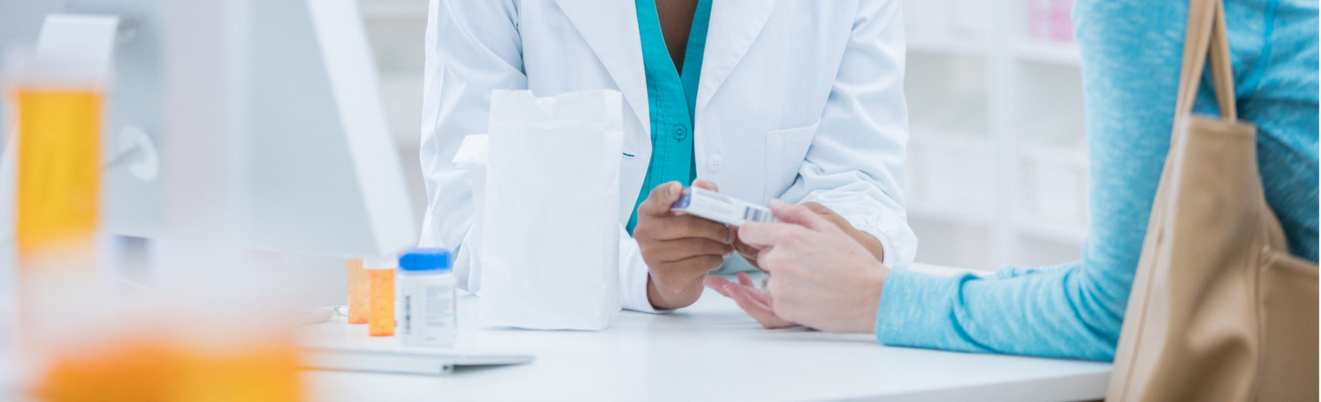 pharmacy technician helping customer