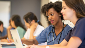 medical students studying in a classroom