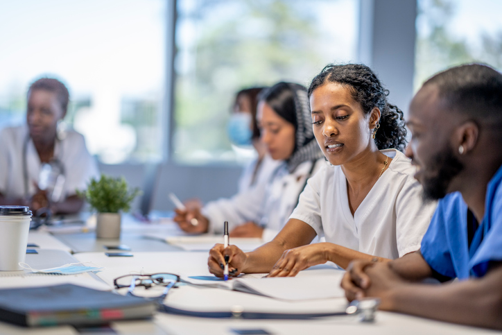 Pharmacy students working on an assignment
