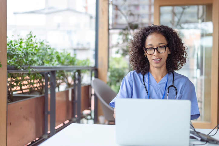 nurse working on her computer