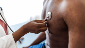 doctor doing a medical exam on a patient
