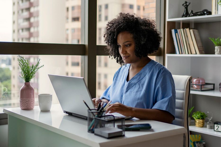 nurse working on her computer