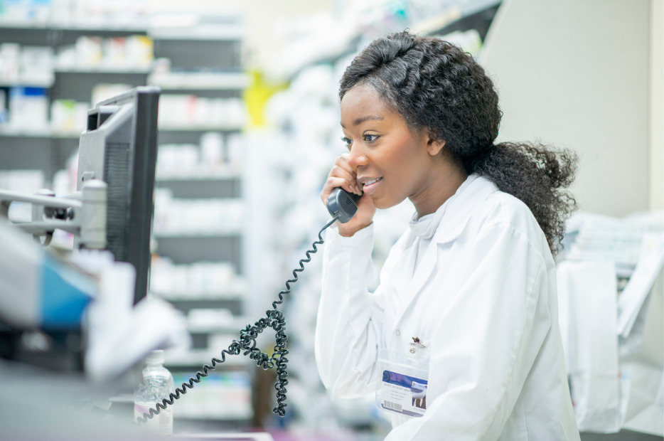 pharmacist taking on a phone