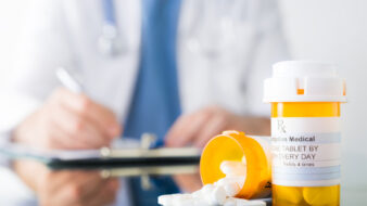 doctor writing a prescription