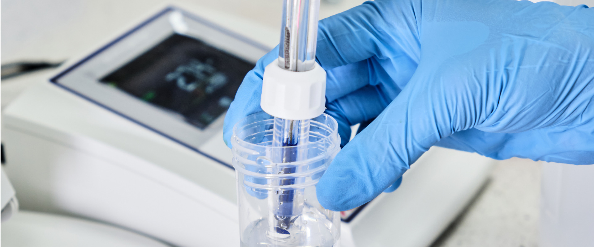 Compounding pharmacist applying advanced sterile compounding practices