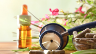 natural medicine and supplements with a stethoscope