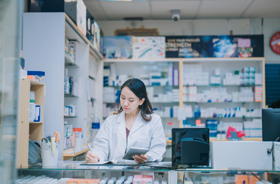 pharmacist doing accreditation paperwork