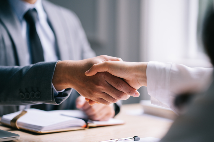business professionals shaking hands