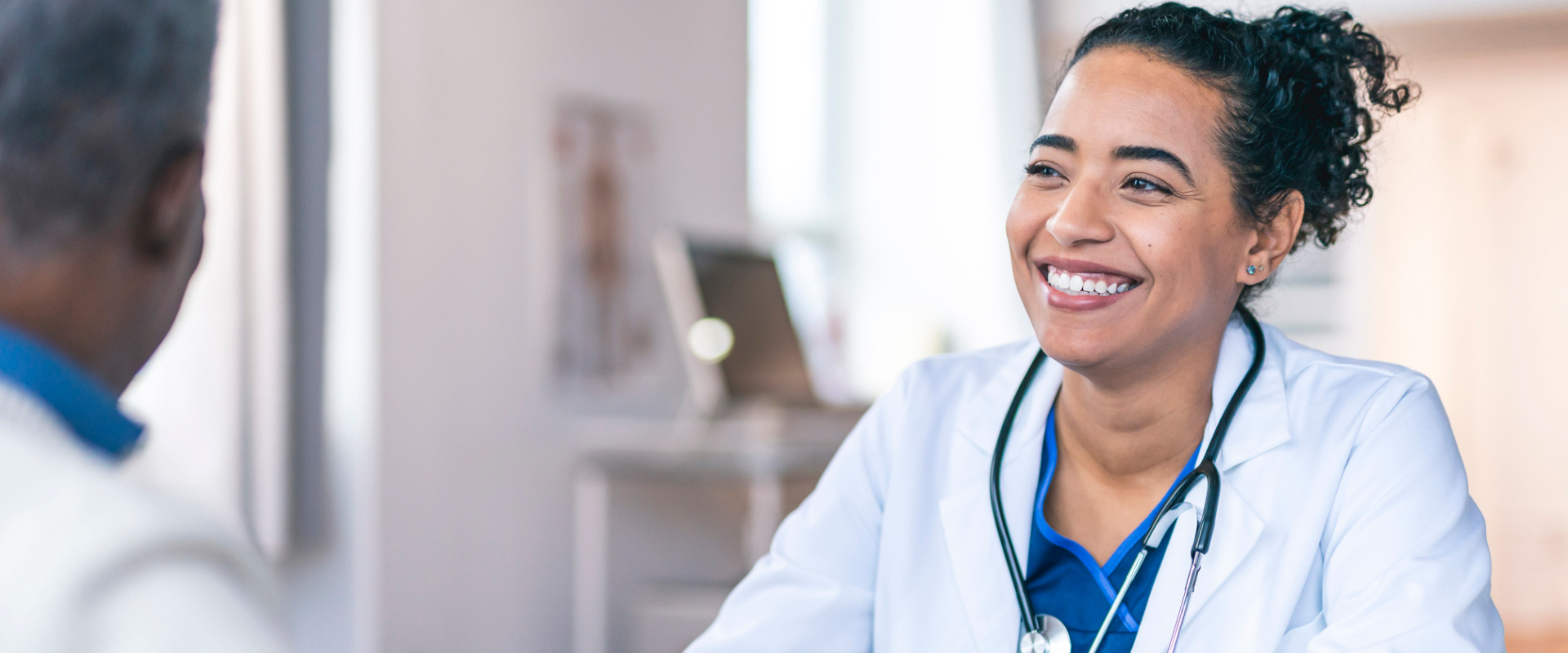 physician speaking with a patient