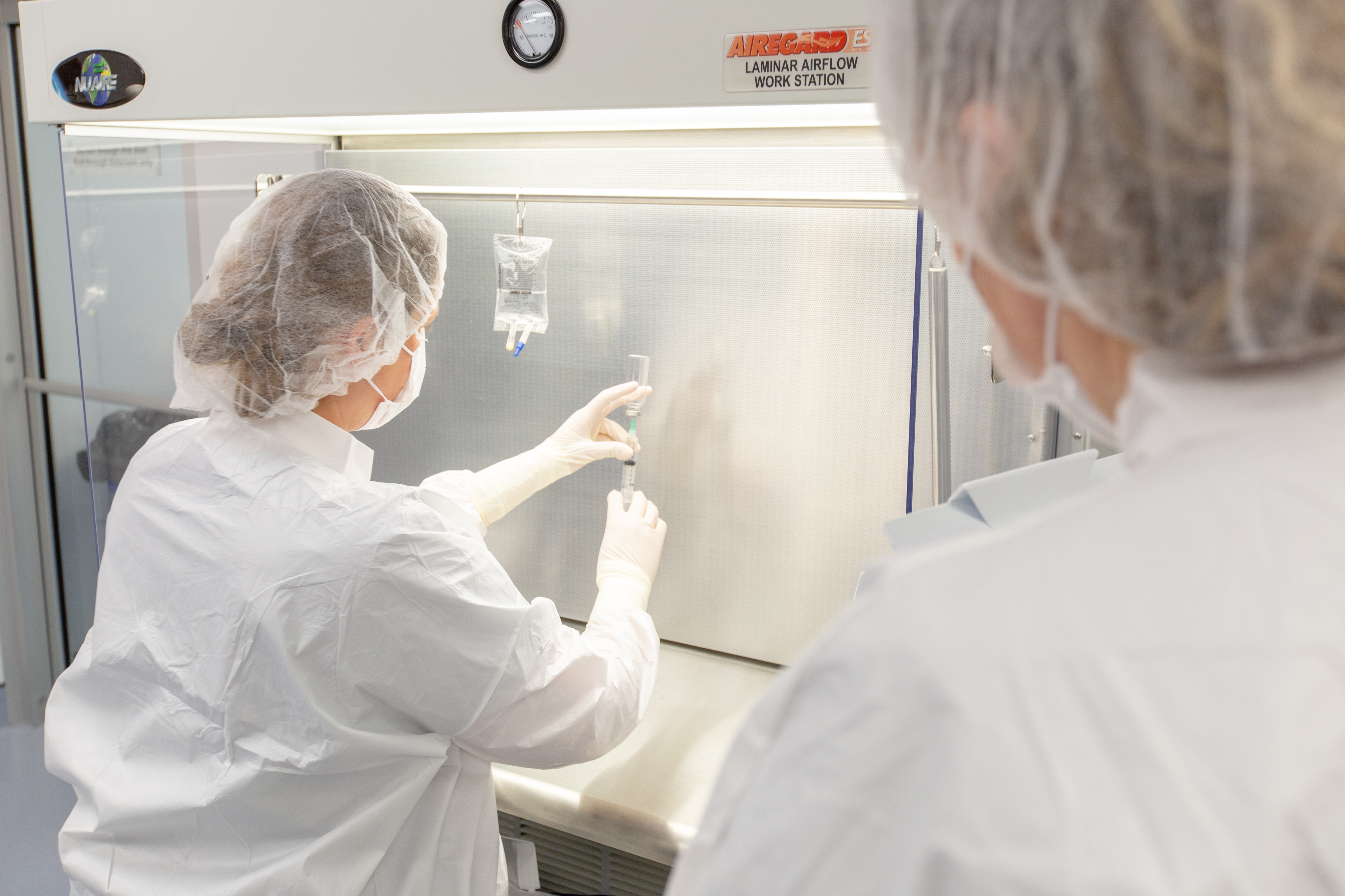 two pharmacists sterile compounding