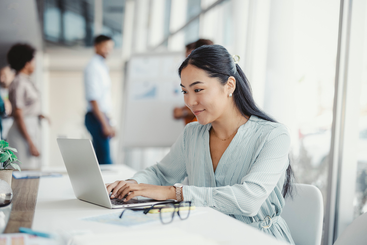 woman working on computer in an office