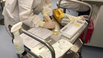 Environmental monitoring sampling being performed