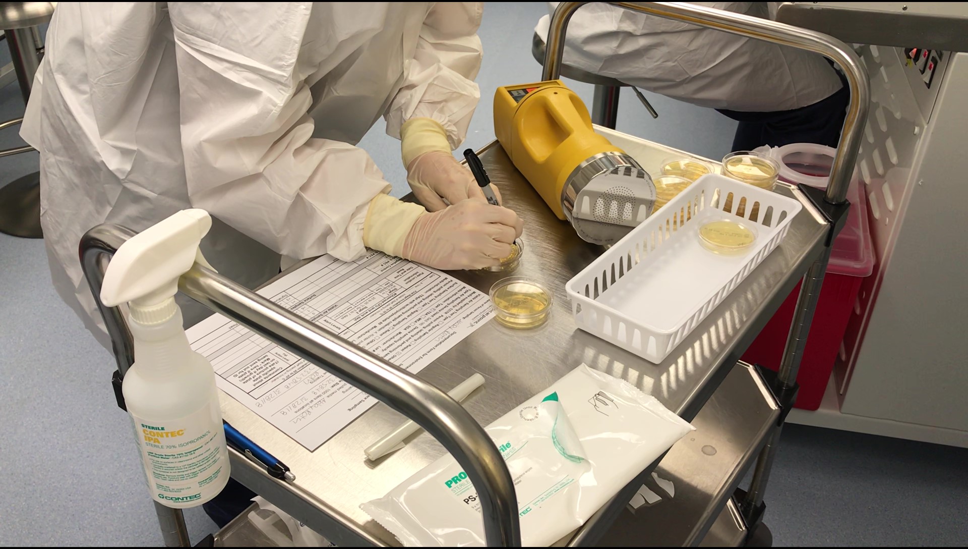 Environmental monitoring sampling being performed