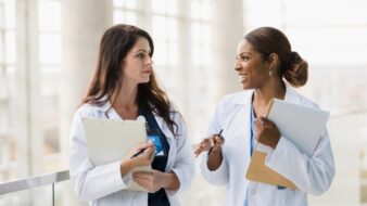 Healthcare professionals talking about clinical resources and continuing education