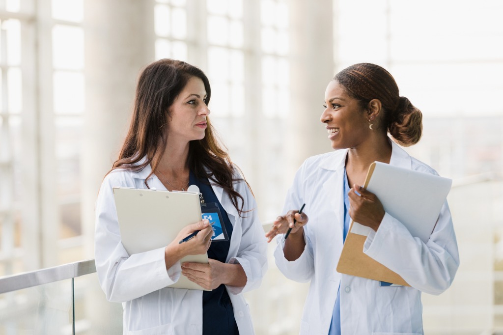Healthcare professionals talking about clinical resources and continuing education